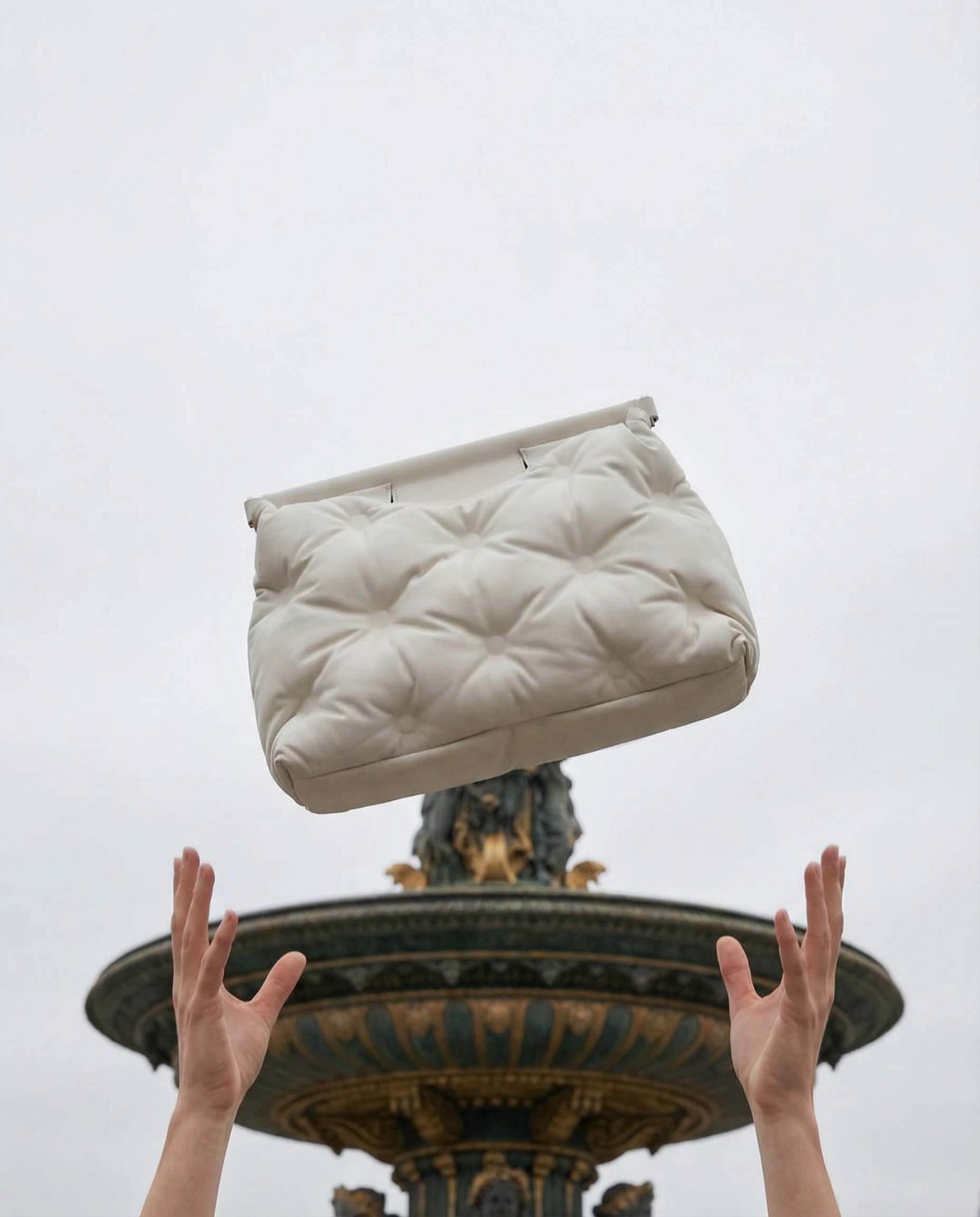 Floating statement bag above a Parisian fountain — cover image, fashion style by lktokb